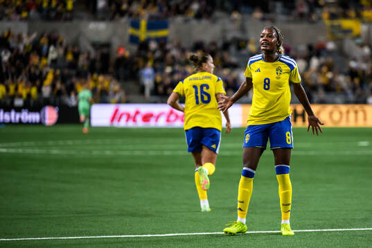 Evelyn Ijeh of Sweden celebrates