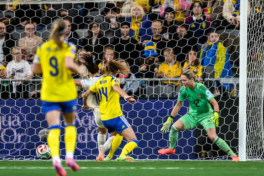 Clara Mateo of France scores the 0-1 goal behind goalkeeper