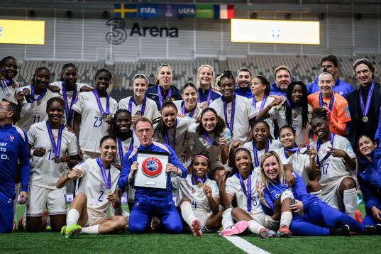 Players of France celebrate