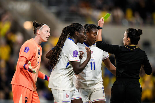 Goalkeeper Pauline Peyraud-Magnin of France receives a