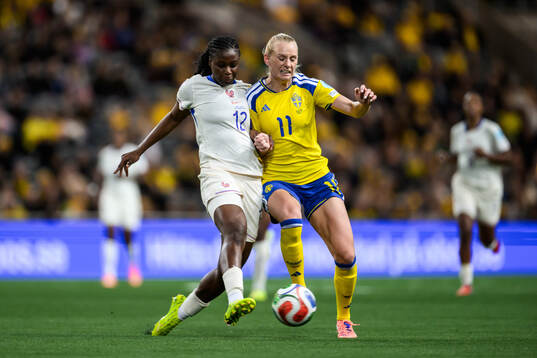 Wassa Sangaré of France and Stina Blackstenius of Sweden