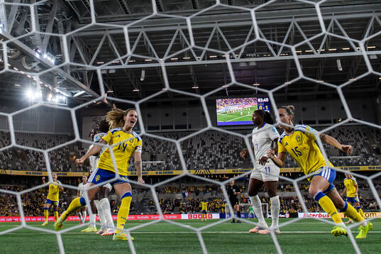 Nathalie Björn and Julia Zigiotti Olme of Sweden celebrate