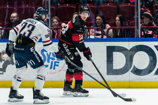 Linköpings Robin Kovacs och Malmö Redhawks Linus Öberg