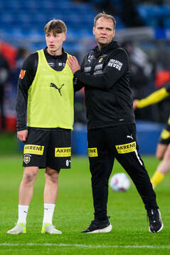 Markus Seehusen Karlsbakk and Head coach Hans Erik