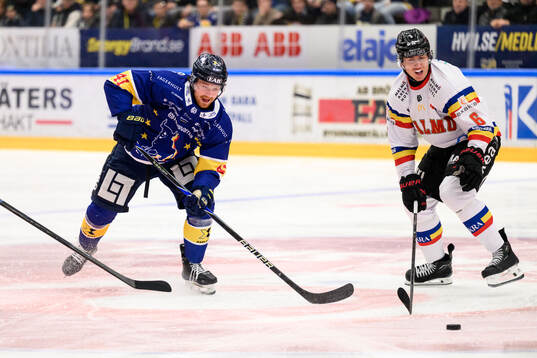 HV71s Riley Woods och Malmö Redhawks Eemil Viro