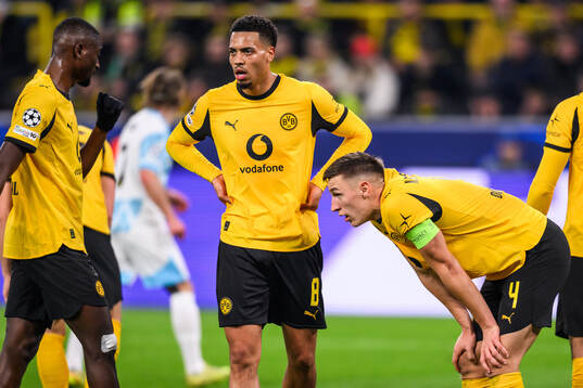 Felix Nmecha and Nico Schlotterbeck  of Borussia Dortmund