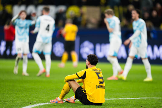 Ramy Bensebaini of Borussia Dortmund looks dejected