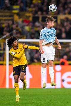 Karim Adeyemi of Borussia Dortmund and Villads Nielsen of