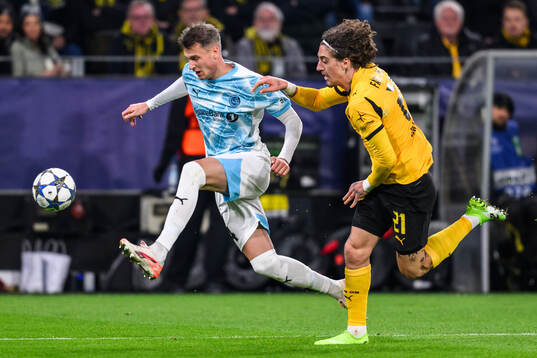 Odin Bjørtuft of Bodø/Glimt and Fábio Silva of Borussia