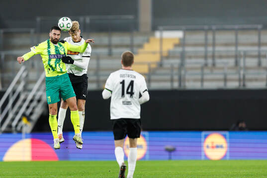 Riad Bajic of AEK Larnaca and Filip Helander of Häcken