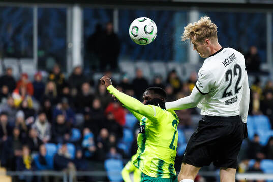 Elohor Godswill of AEK Larnaca and Filip Helander of Häcken