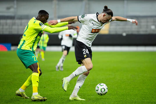 Elohor Godswill of AEK Larnaca and Amor Layouni of Häcken
