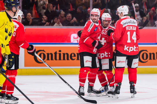 Damien Riat of Switzerland celebrates