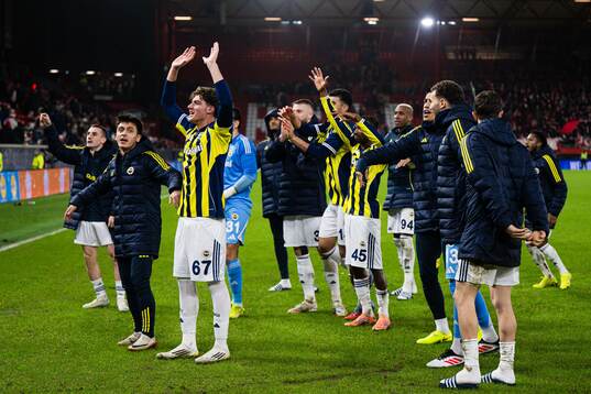 Players of Fenerbache celebrates