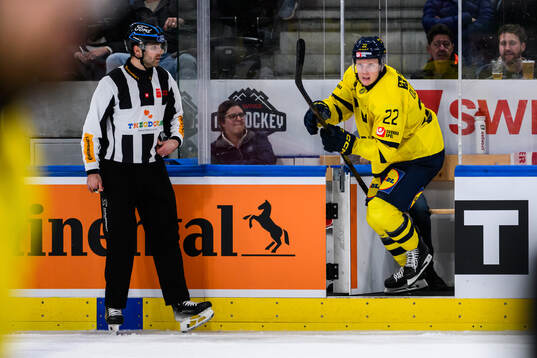 Fredrik Olofsson of Sweden in the ice hockey game between