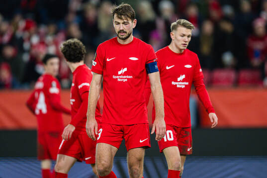 Fredrik Pallesen Knudsen of Brann looks dejected