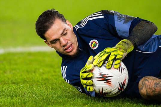 Goalkeeper Ederson of Fenerbahce warms up