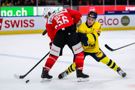 Isac Hedqvist of Sweden and Tim Berni of Switzerland in the