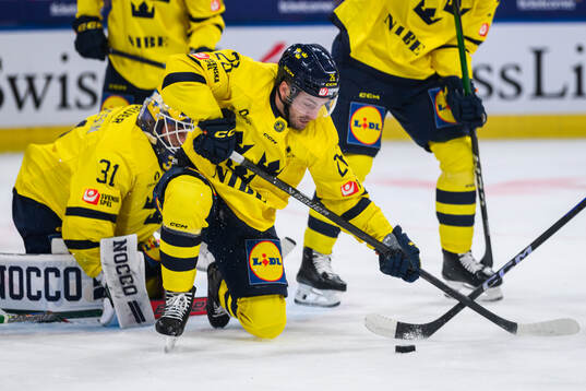 Erik Brännström of Sweden in the ice hockey game between