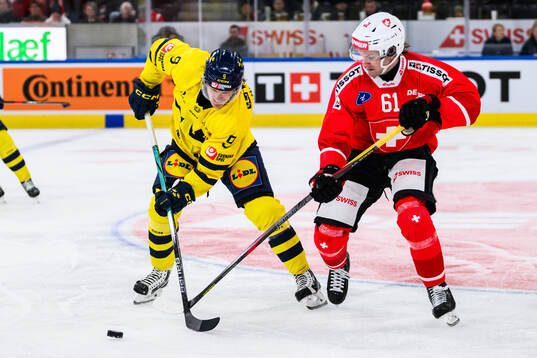 Marcus Sörensen of Sweden and Dario Rohrbach of