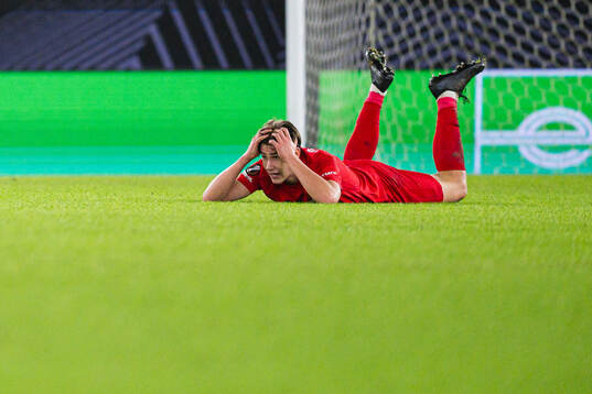 Eivind Helland of Brann looks dejected