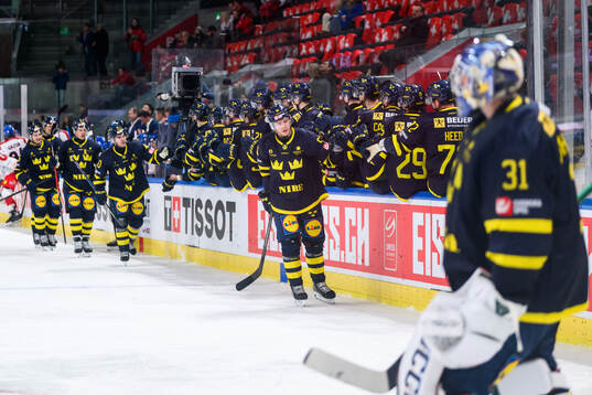 Rickard Hugg of Sweden celebrates