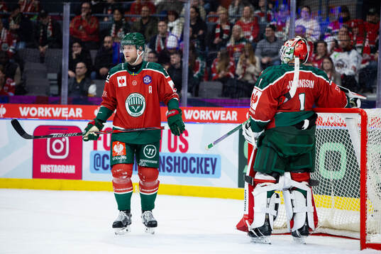 Christian Folin of Frölunda and goaltender Lars Johansson