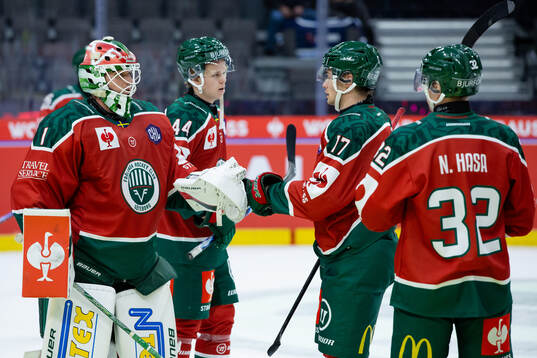 Goaltender Lars Johansson of Frölunda celebrates with team