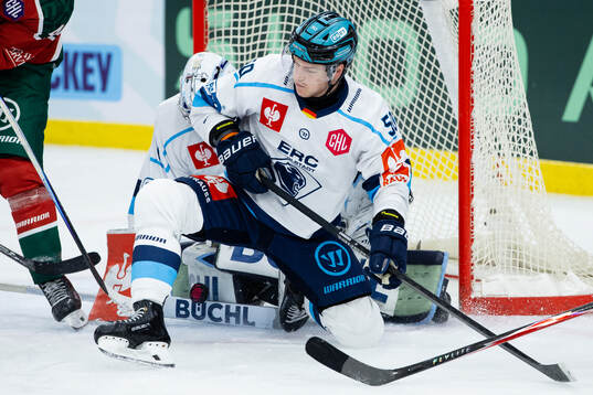 Goaltender Nico Pertuch and Peter Spornberger of Ingolstadt