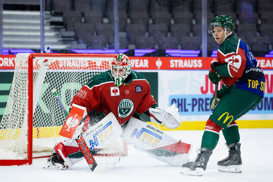 Goaltender Lars Johansson and Max Friberg of Frölunda