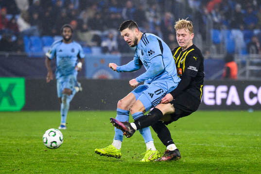Kevin Wimmer of Slovan Bratislava and Isak Brusberg of