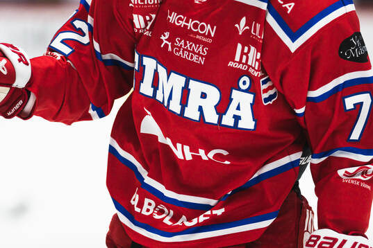 Timrås klubbmärke
