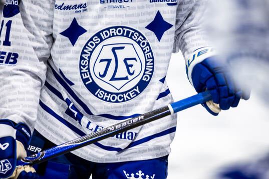Leksands klubbmärke på tröjan