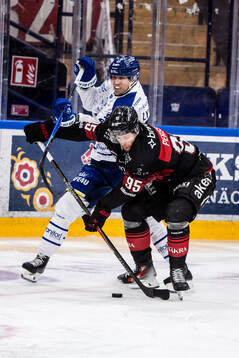 Leksands Joonas Lyytinen och Malmö Redhawks Carl Persson