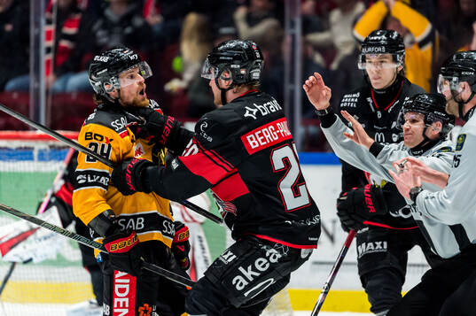 Luleås Brendan Shinnimin och Malmö Redhawks Thomas Berg