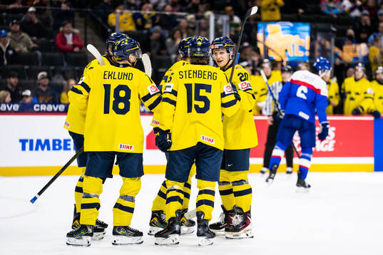 Anton Frondell of Sweden celebrates with team mates