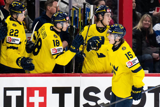 Ivar Stenberg of Sweden celebrates with Victor Eklund