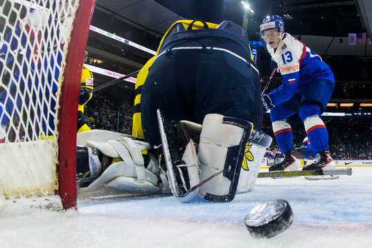 Tobias Tomik of Slovakia scores the 2-2 goal