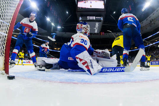Goaltender Alan Lendak of Slovakia looks dejected