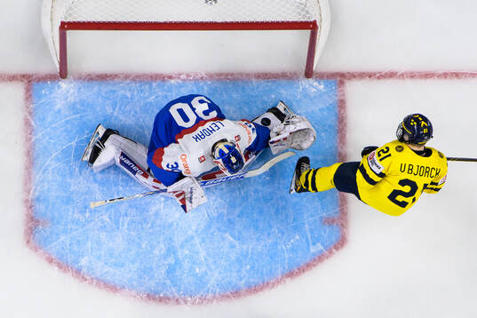Viggo Björck of Sweden scores a disallowed 3-1 goal behind