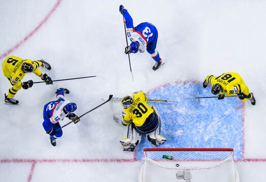 Tobias Tomik of Slovakia scores the 2-2 goal behind