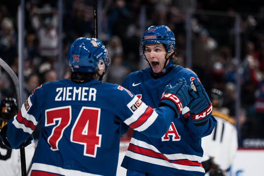Brodie Ziemer and Will Horcoff of USA celebrates