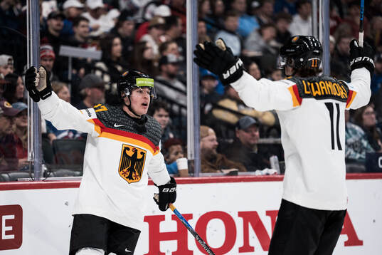 Simon Seidl and David Lewandowski of Germany celebrates