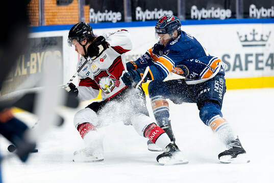Malmö Redhawks Lauri Pajuniemi och Växjös Keegan Lowe