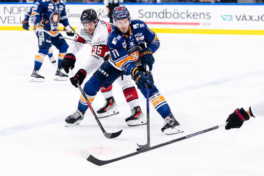 Malmö Redhawks Carl Persson och Växjös Brogan Rafferty