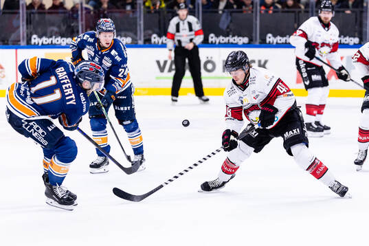 Växjös Brogan Rafferty och Malmö Redhawks Lauri Pajuniemi