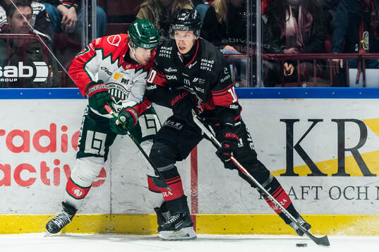Frölundas Henrik Tömmernes och Malmö Redhawks William