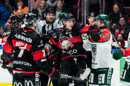 Bråk mellan Malmö Redhawks Janne Kuokkanen och Frölundas