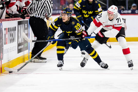 Casper Juustovaara Karlsson of Sweden and Beni Waidacher of