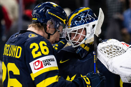 Jack Berglund and goaltender Love Härenstam of Sweden